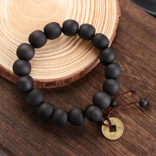 Cargar imagen en el visor de la galería, PULSERA CON CUENTAS DE MADERA Y MONEDA DE COBRE.
