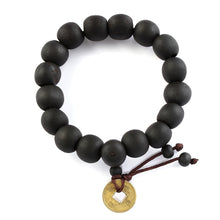 Cargar imagen en el visor de la galería, PULSERA CON CUENTAS DE MADERA Y MONEDA DE COBRE.
