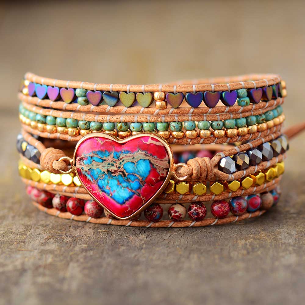 PULSERA  CON CUENTAS DE CORAZON.