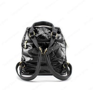 BOLSO MOCHILA DE PLUMAS.